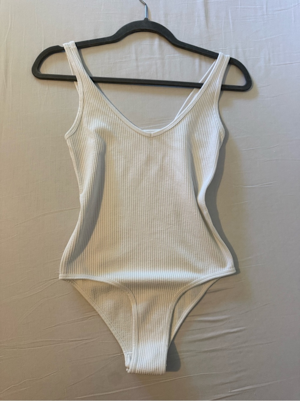 bebe vintage White Ribbed V-Neck Sleeveless Bodysuit